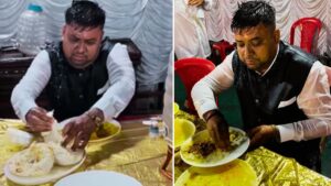Viral Video: झमाझम बारिश भी नहीं तोड़ पाई हौसला, मजे से शादी की दावत उड़ाते दिखा बंदा