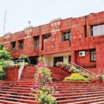 JNUTA की इमरजेंसी मीटिंग में डॉ. रोहन की सेवा समाप्ति पर विरोध तेज, VC को हटाने…