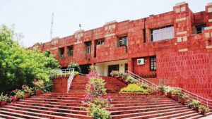JNUTA की इमरजेंसी मीटिंग में डॉ. रोहन की सेवा समाप्ति पर विरोध तेज, VC को हटाने…